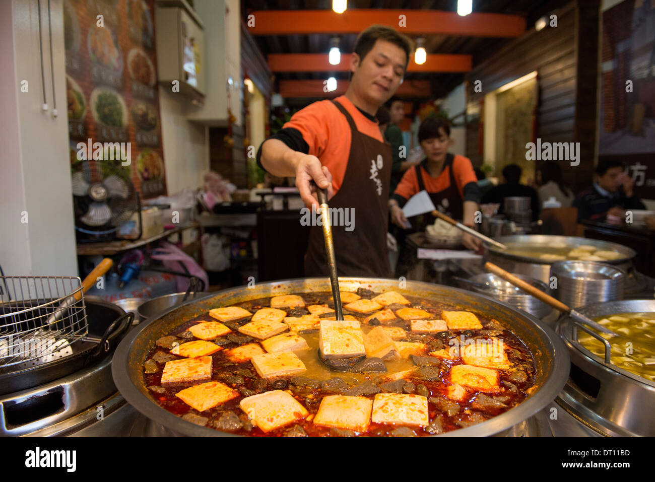 Stinky Tofu is a local street food favorite in Taiwan. Stock Photo