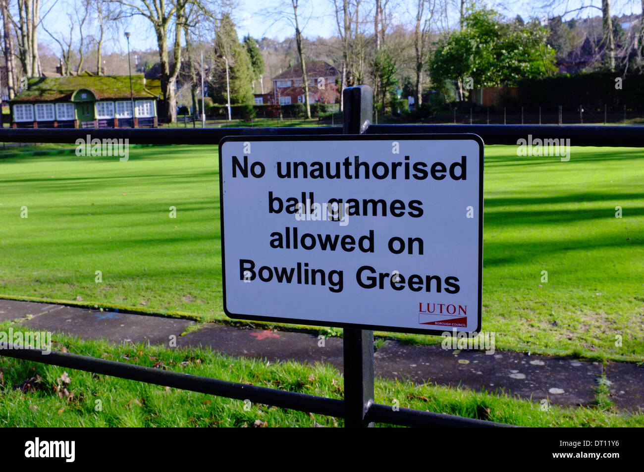 Bowling green in Wardown Park, Luton warning against unauthorized ball games Stock Photo