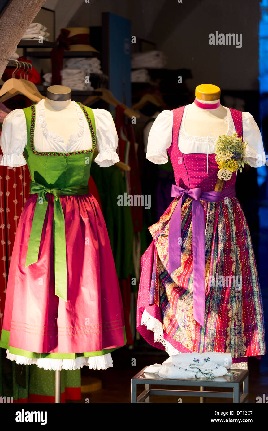 Traditional Tyrolean dirndl dresses in shop window in Herzog Friedrich Strasse in Innsbruck in the Tyrol, Austria Stock Photo