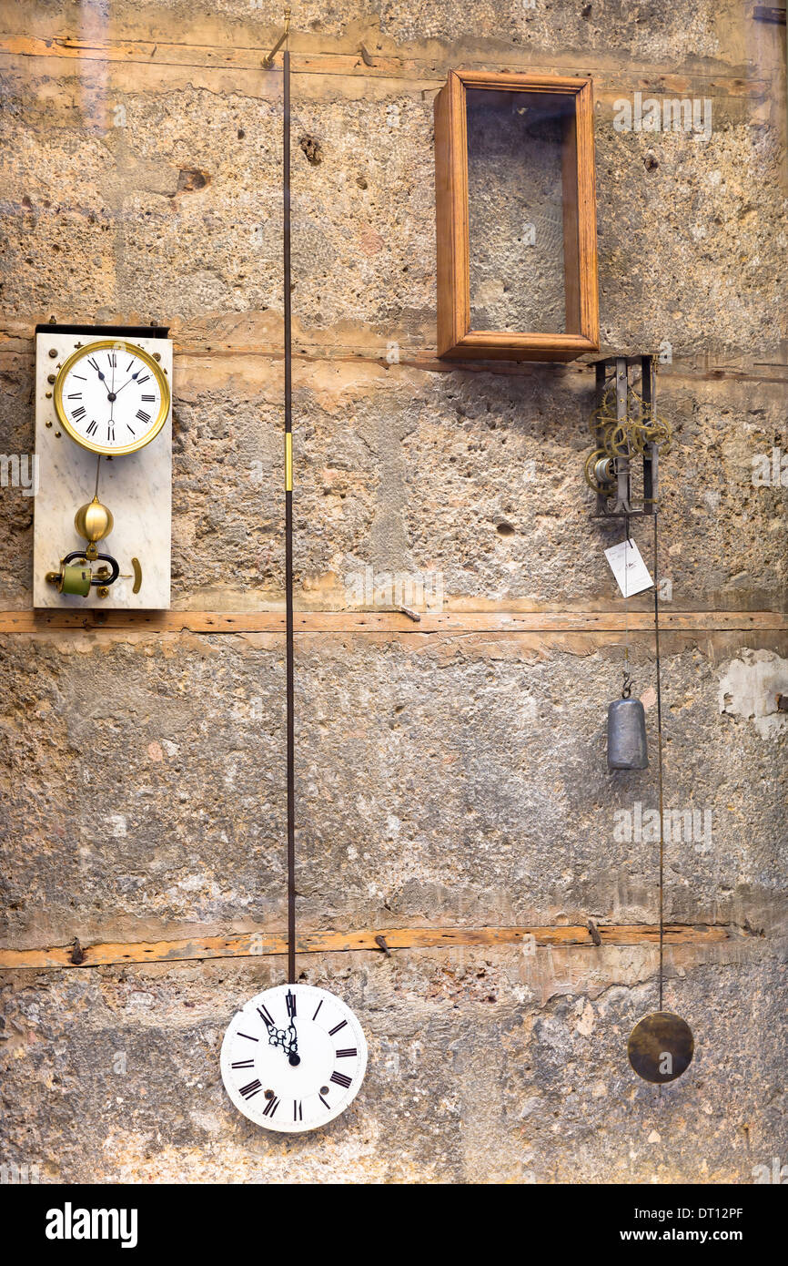 Antique clocks in window of Schmougruber shop in Pfarrgasse in Innsbruck, the Tyrol, Austria Stock Photo