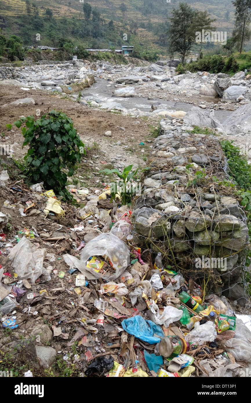 Garbage strewn along a stream in the Gorkha region of Nepal. Stock Photo