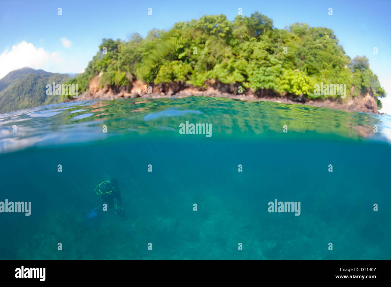 Half and half shot with island and scuba diver, Opposite Tenate