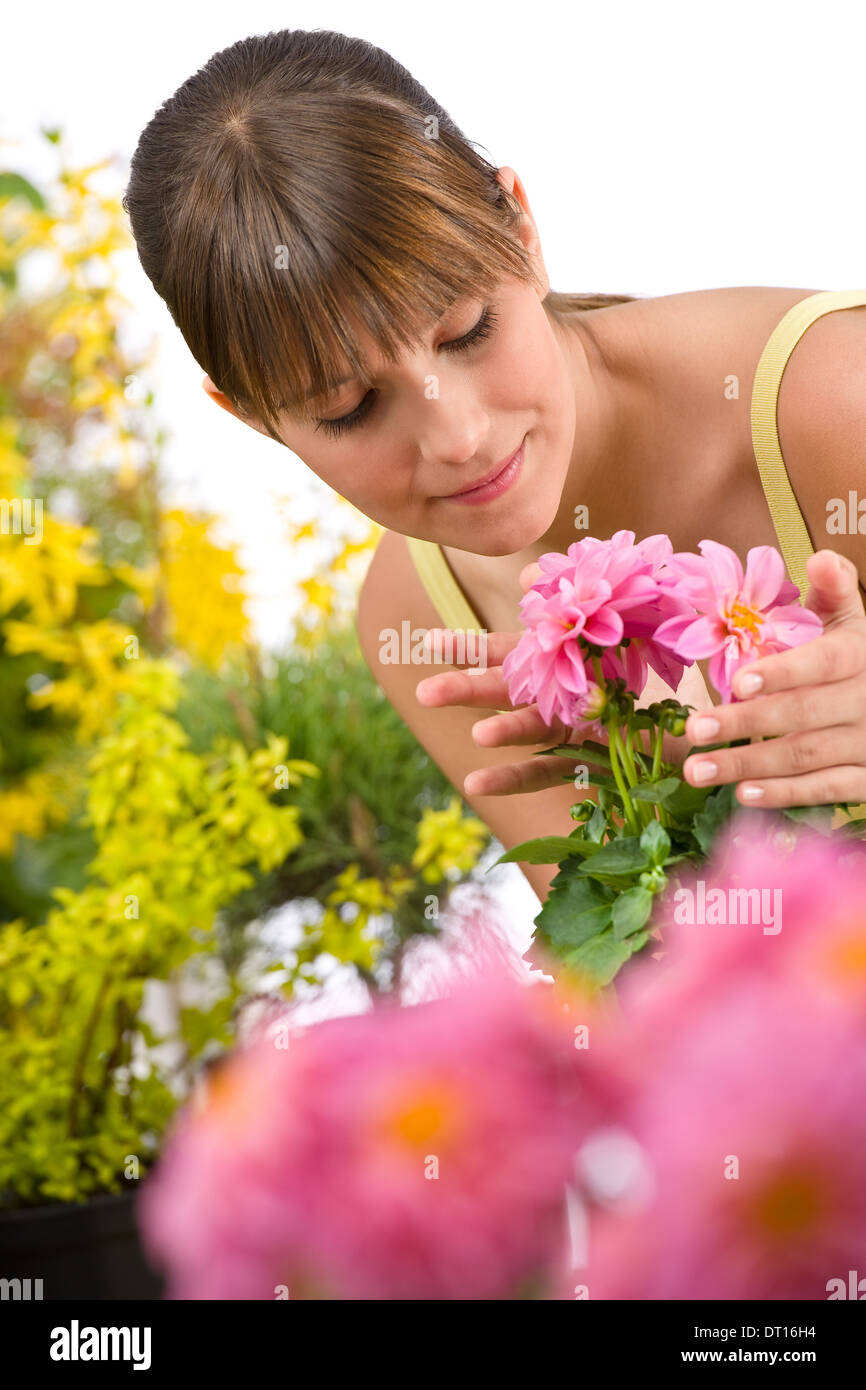 Gardening - smiling woman with flower Stock Photo