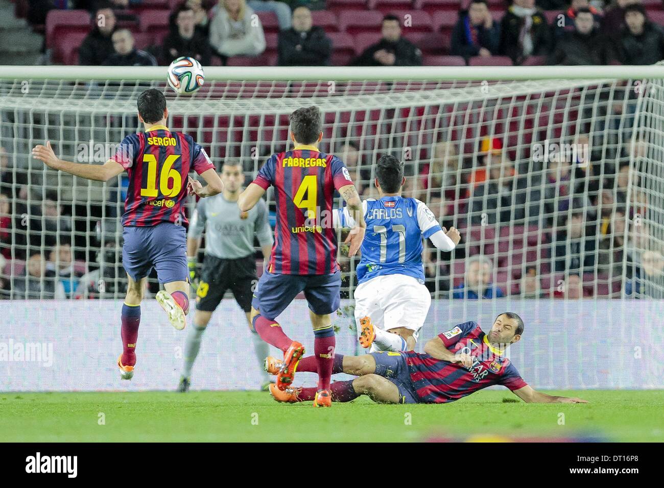 Barcellona, Spain. 5th Feb, 2014. BARCELONA, ESPANA - FEBRERO 5: Ocasion de gol de Carlos Vela evitada por Javier Mascherano en el partido entre el FC Barcelona y la Real Sociedad, correspondiente al partido de ida de semifinales de la Copa del Rey en el Estadio del Camp Nou el 5 de febrero de 2014 en Barcelona, Espana, Credit:  Mikel Trigueros/NurPhoto/ZUMAPRESS.com/Alamy Live News Stock Photo