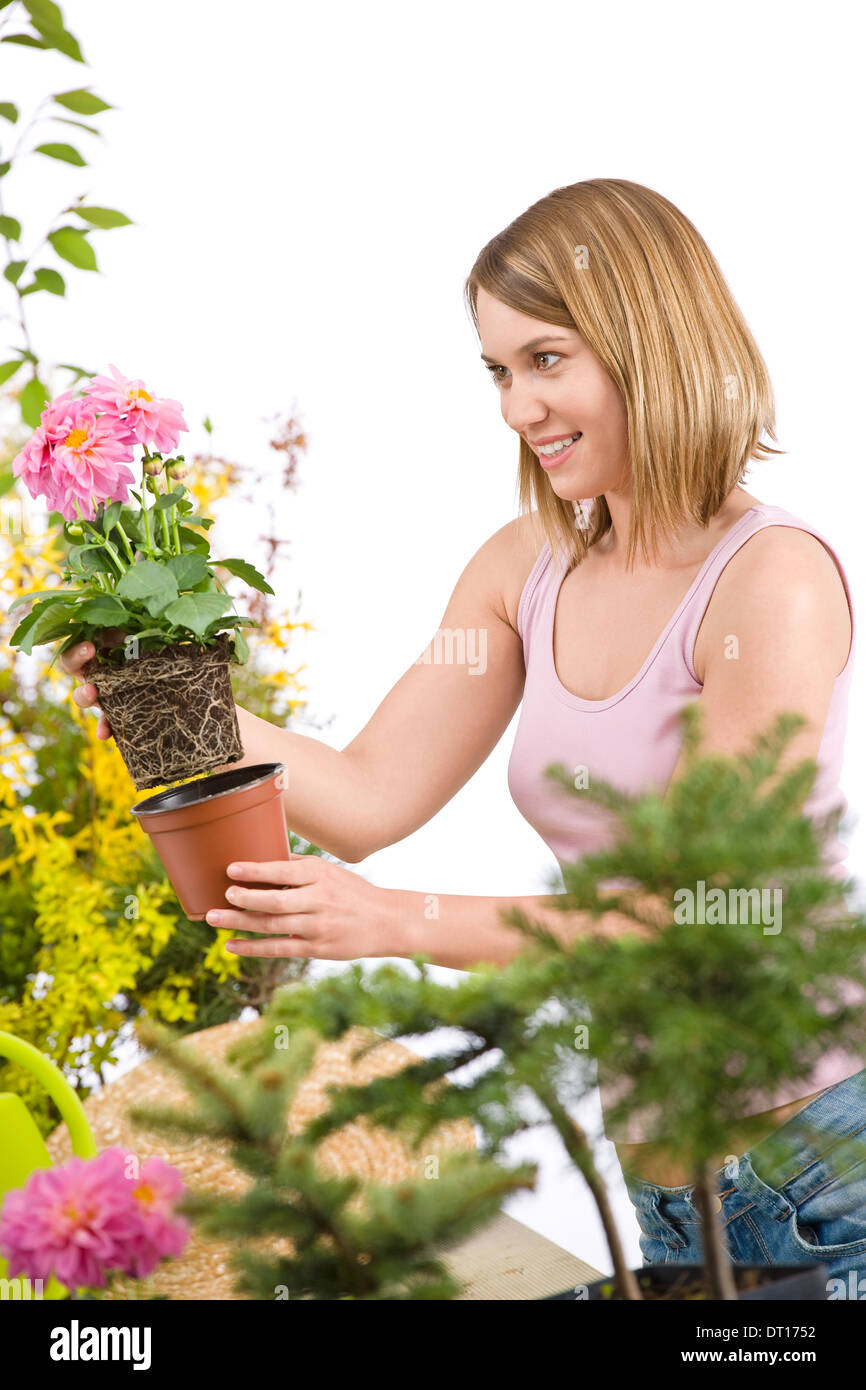 Gardening - Happy woman holding flower pot Stock Photo - Alamy