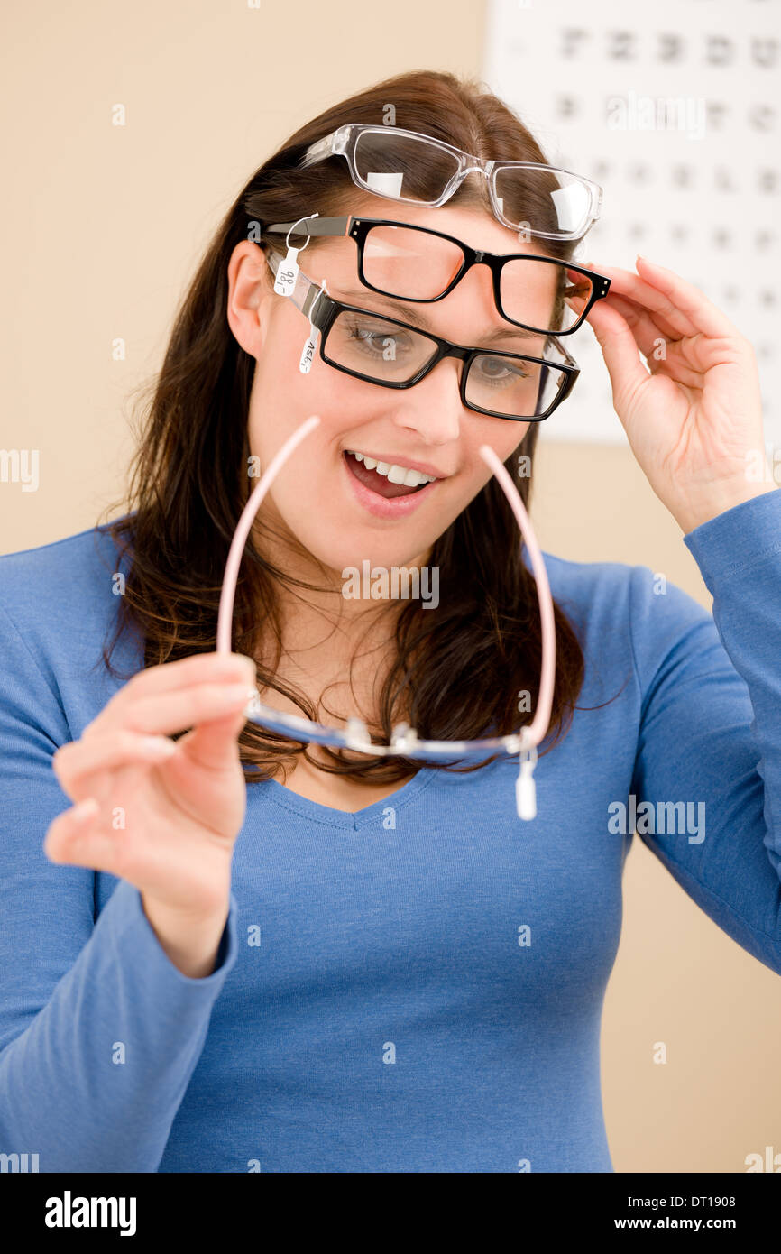 Optician client choose prescription glasses Stock Photo Alamy