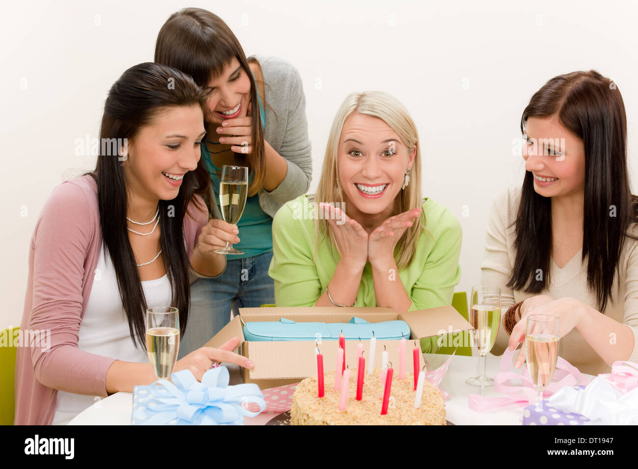 Birthday party - surprised woman celebrate Stock Photo