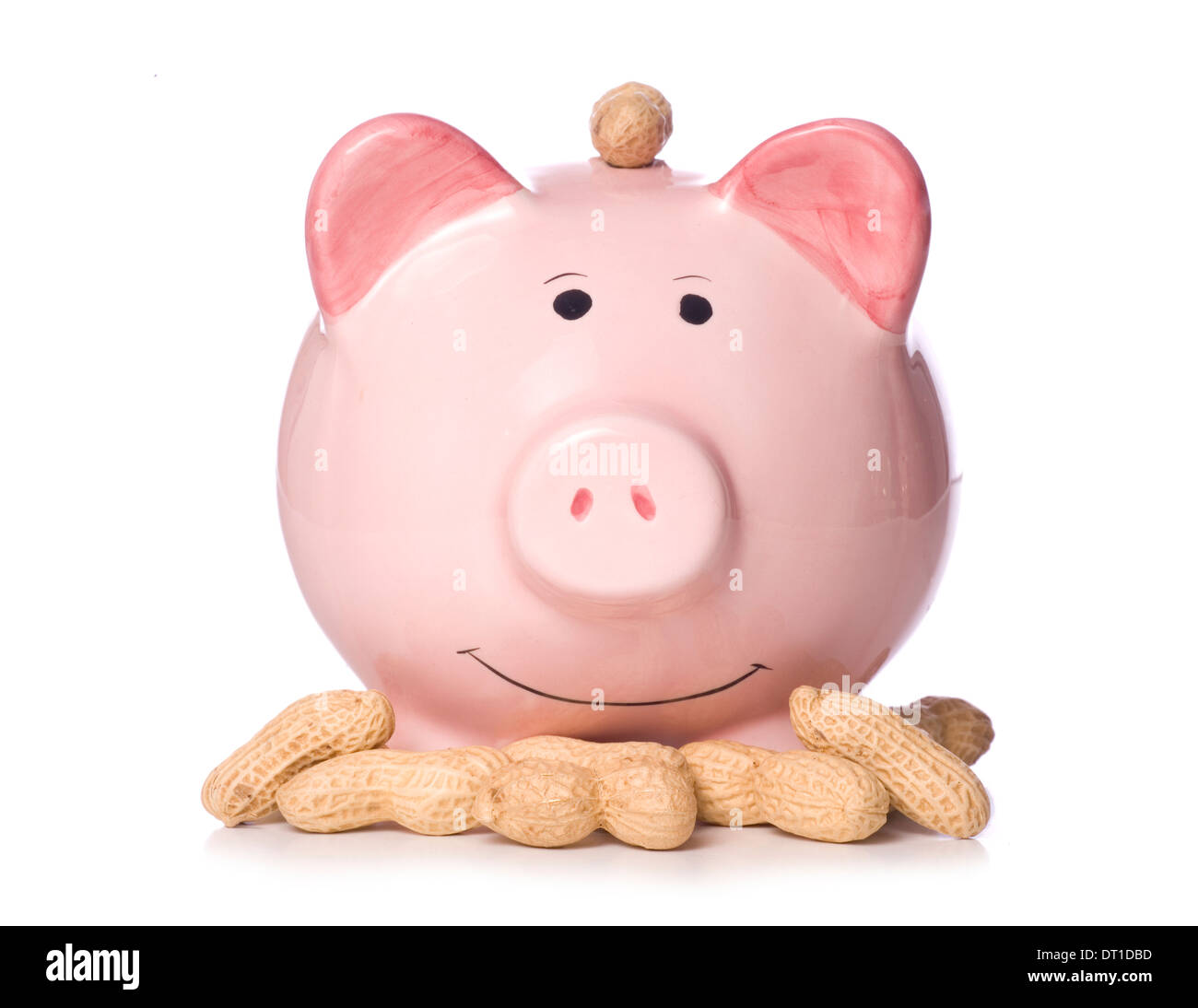 Earning peanuts piggy bank studio cutout Stock Photo