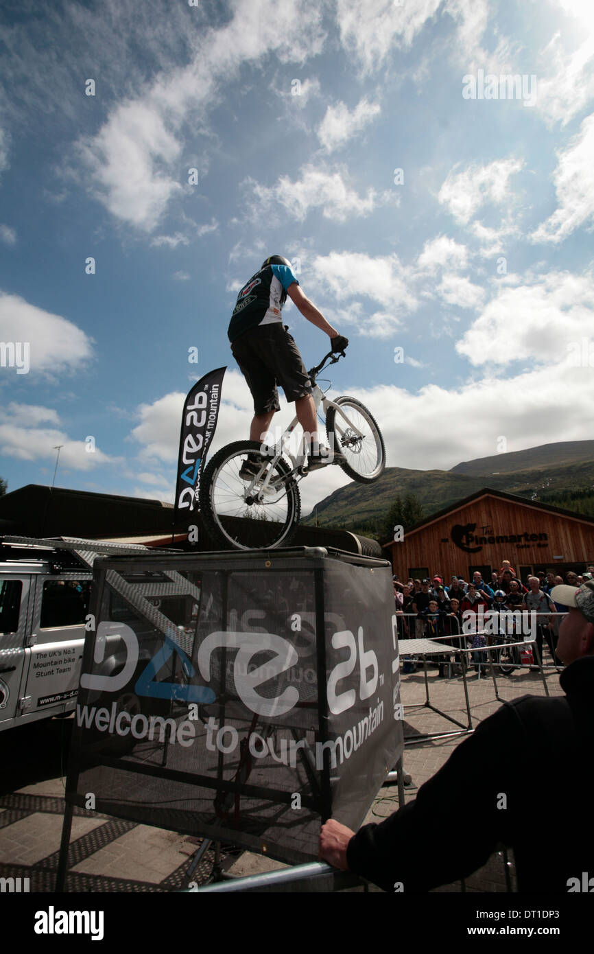 Trials rider performing at UCI World Cup MTB Downhill at Fort William