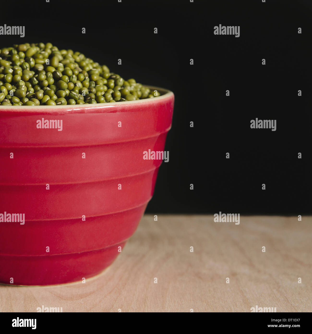 Bowl of mung beans (a legume also know as green gram or golden gram) Stock Photo