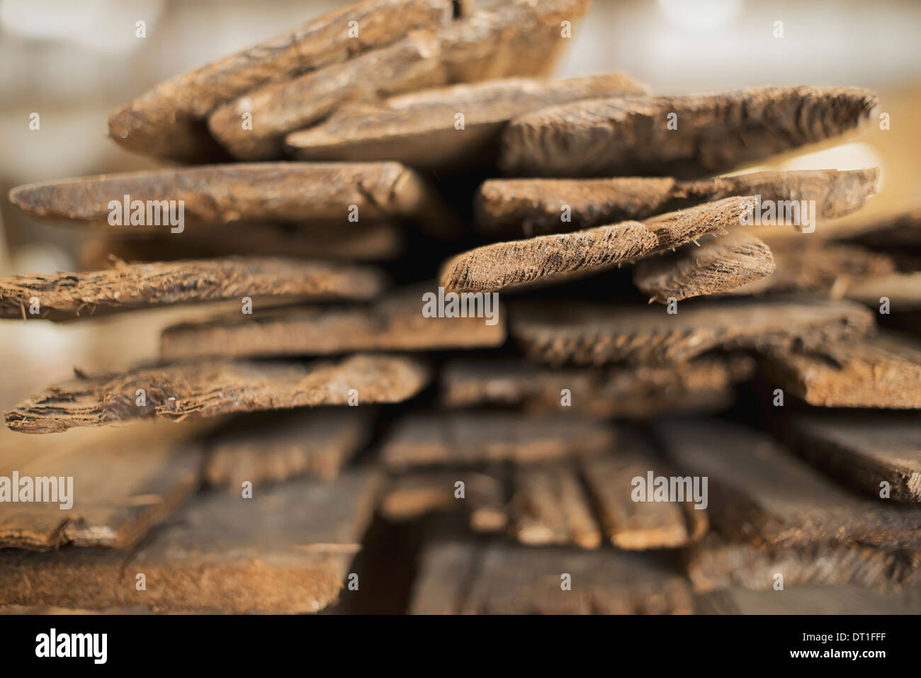A heap of recycled reclaimed timber planks of wood Environmentally