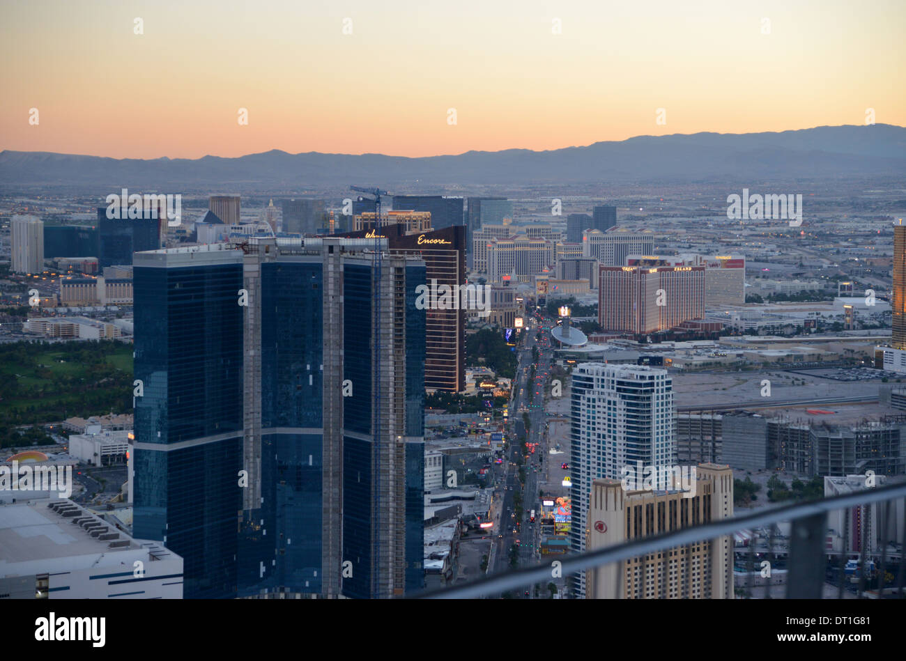 Dusk over Las Vegas, lights come on along the Strip, see from the high vantage point of the Stratosphere tower Stock Photo