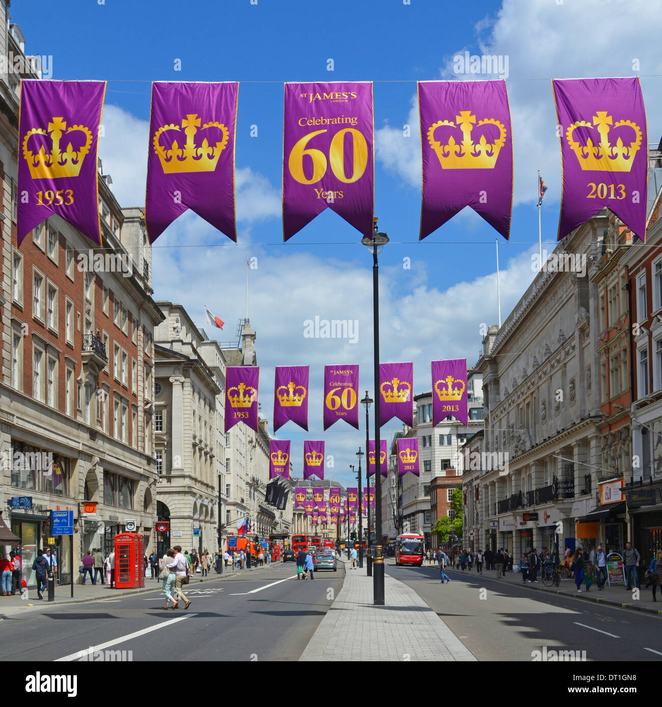 Banners in London Piccadilly celebrating the Anniversary of Queen Elizabeths coronation (view towards Piccadilly Circus) Stock Photo