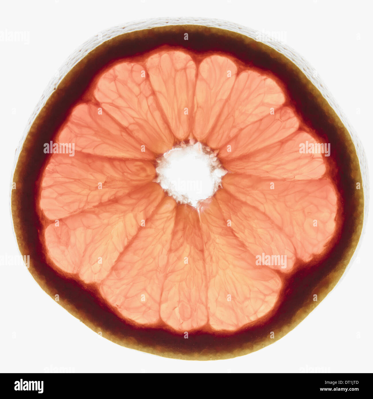 Slice of organic ruby red grapefruit on white background Stock Photo