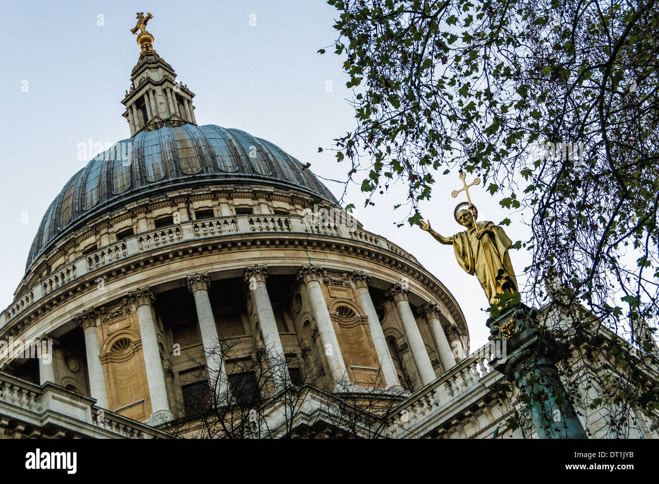 St Paul's Cross memorial statue and dome of St Paul's Cathedral in St Paul's Churchyard, London. Stock Photo