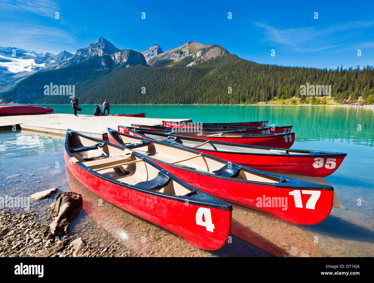 Red canoes lake louise banff national park alberta canoe hires stock photography and images Alamy