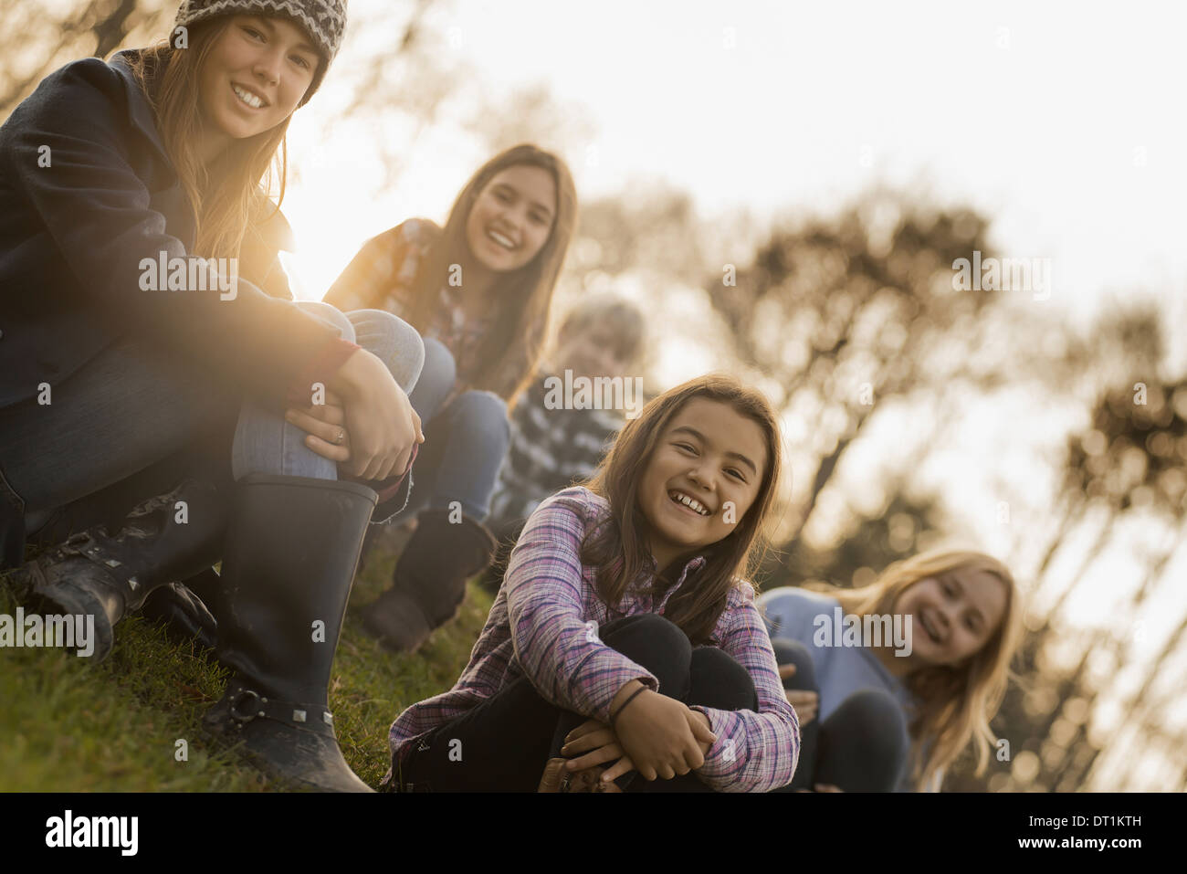 A large group of young children girls and boys outdoors on a winter day on an organic farm Stock Photo