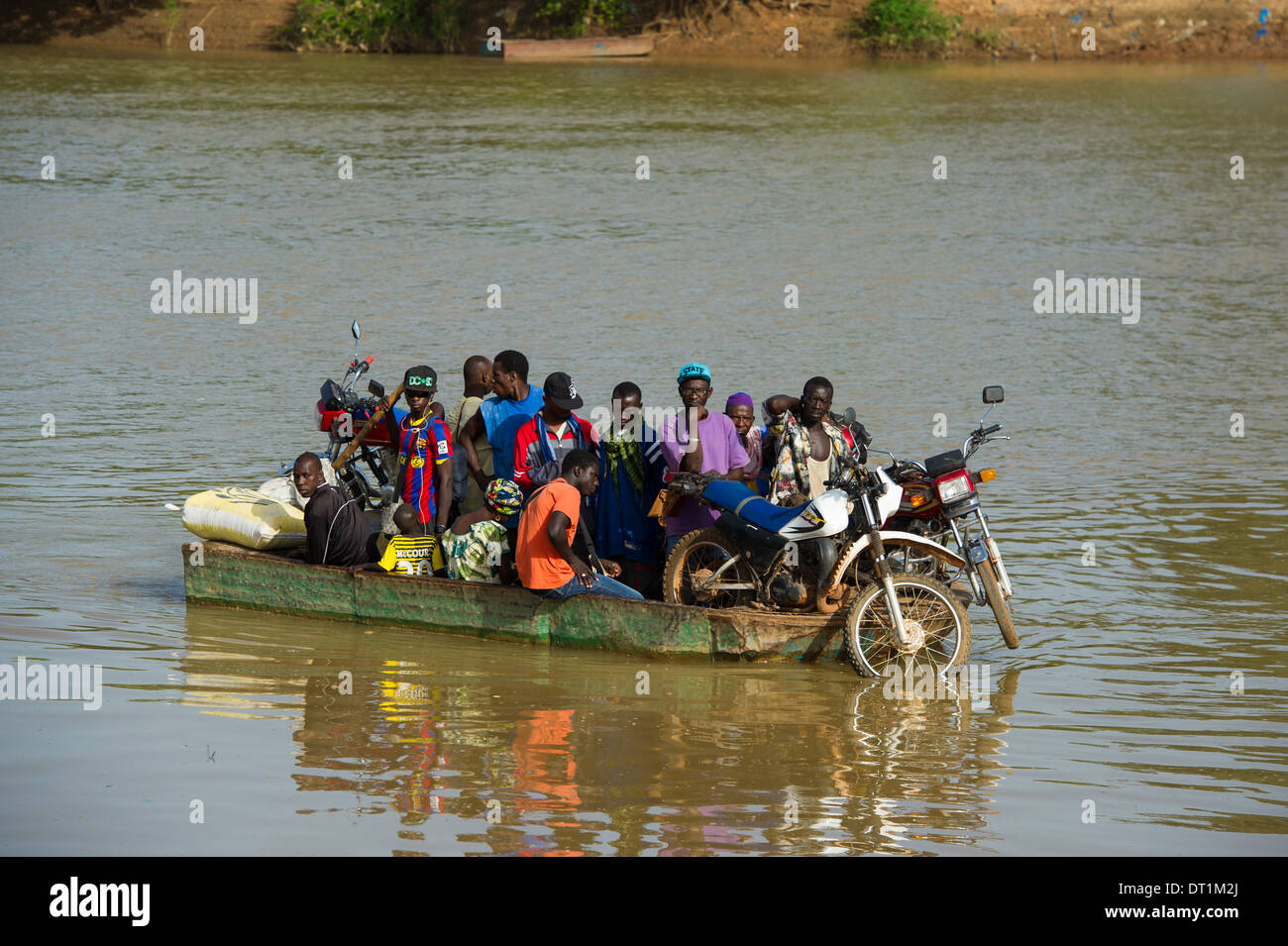 Boat crossing the Gambia River, Basse Santa Su, the Gambia Stock Photo