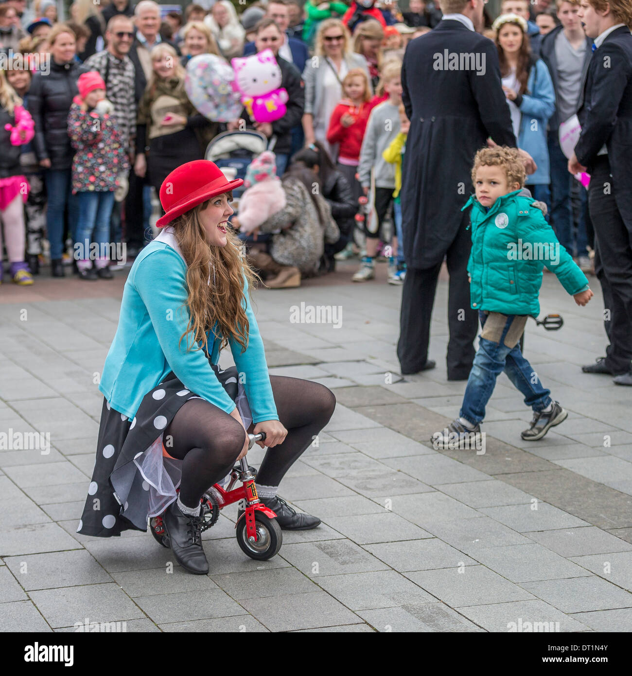 Girl entertaining crowds on June 17th, Iceland's Independence day.  Reykjavik, Iceland Stock Photo