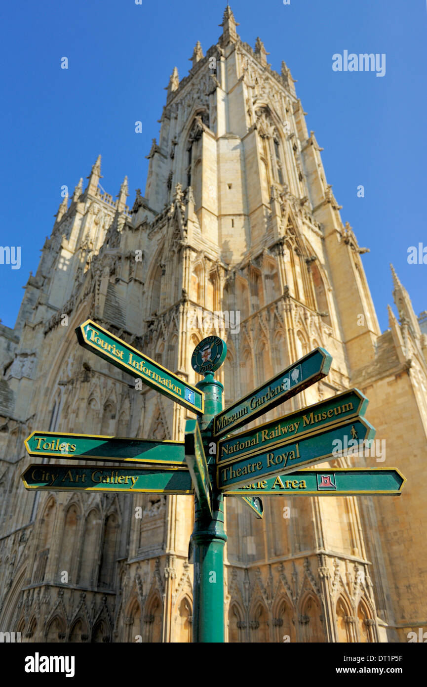 Tourist information signpost with York Minster in the background, Duncombe Place, York, Yorkshire, England, UK Stock Photo