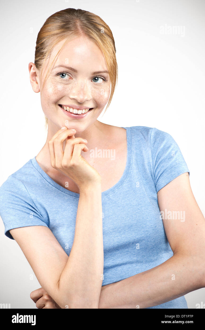 Young woman daydreaming, portrait Stock Photo