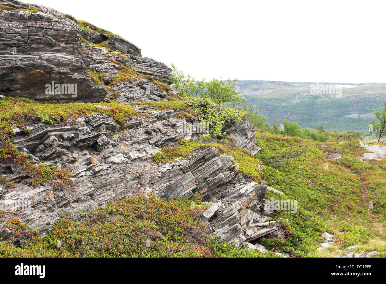 Geological rock layers of norwegian mounatins Stock Photo - Alamy