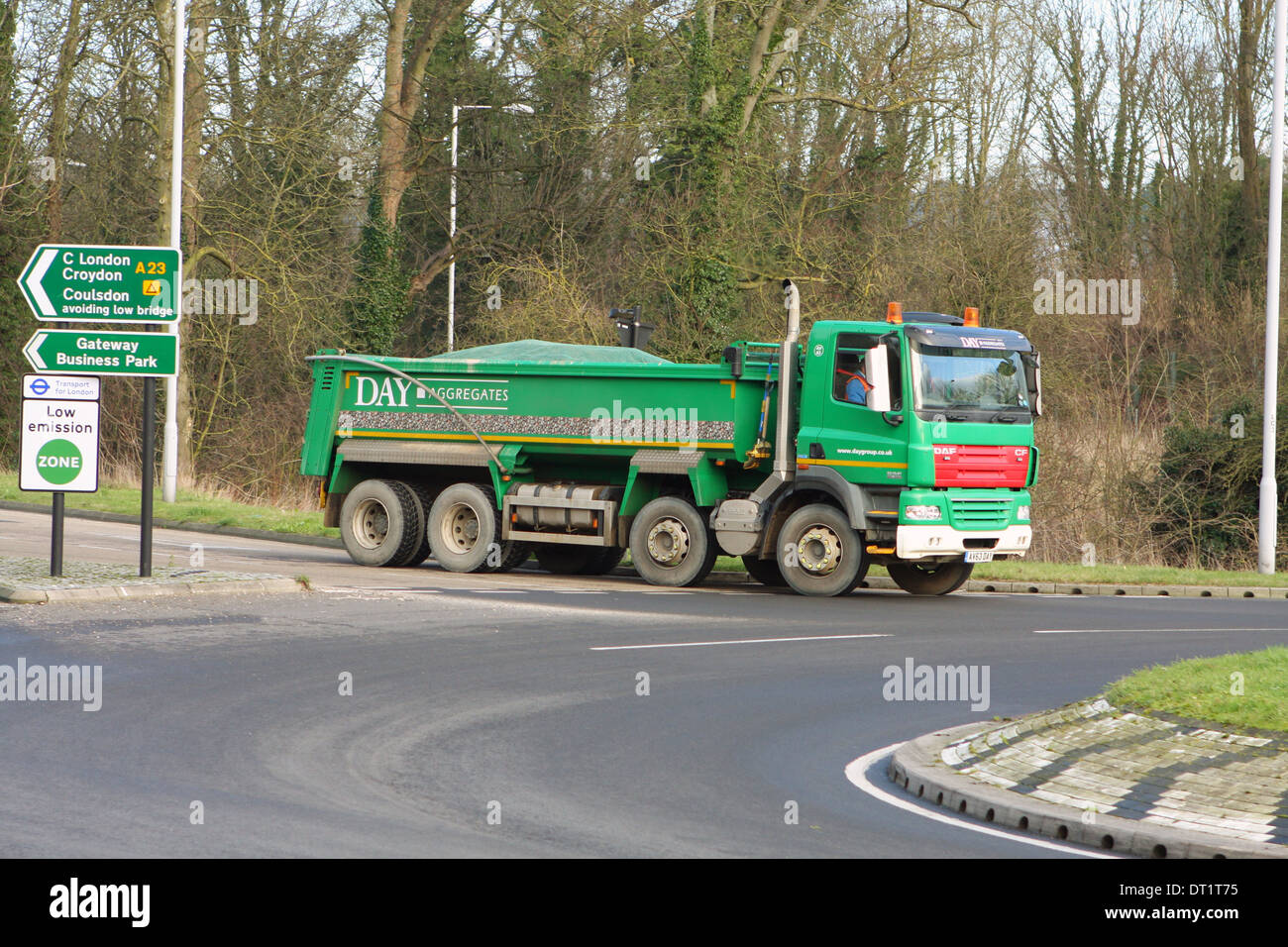 A truck entering a roundabout in Coulsdon, Surrey, England. Stock Photo