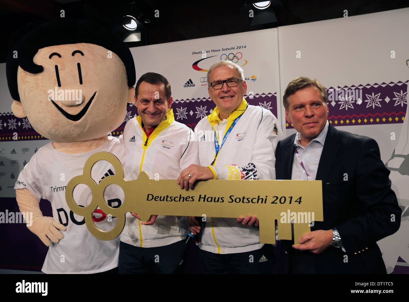 Krasnaya Polyana, Krasnodar region, Russia. 06th Feb, 2014. (L-R) President of the DOSB, Alfons Hoermann, Michael Vesper, Chef de Mission and Head of German Olympic Team and Axel Achten, CEO of Deutsche Sport-Marketing (DSM), pose with an large key during the Opening of the Deutsches Haus (German House) in Gorki Village near Krasnaya Polyana, Krasnodar region, Russia, 06 February 2014. The Olympic Winter Games 2014 in Sochi run from 07 to 23 February 2014. Photo: Kay Nietfeld/dpa/Alamy Live News Stock Photo