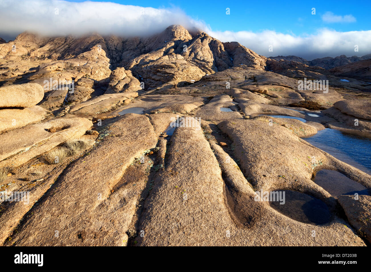 Clouds in desert mountains Bektau-Ata in Kazakhstan Stock Photo