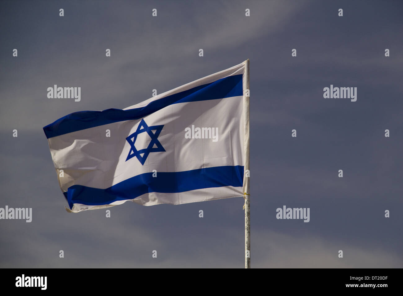 The blue and white national flag of Israel blowing in the wind Stock ...