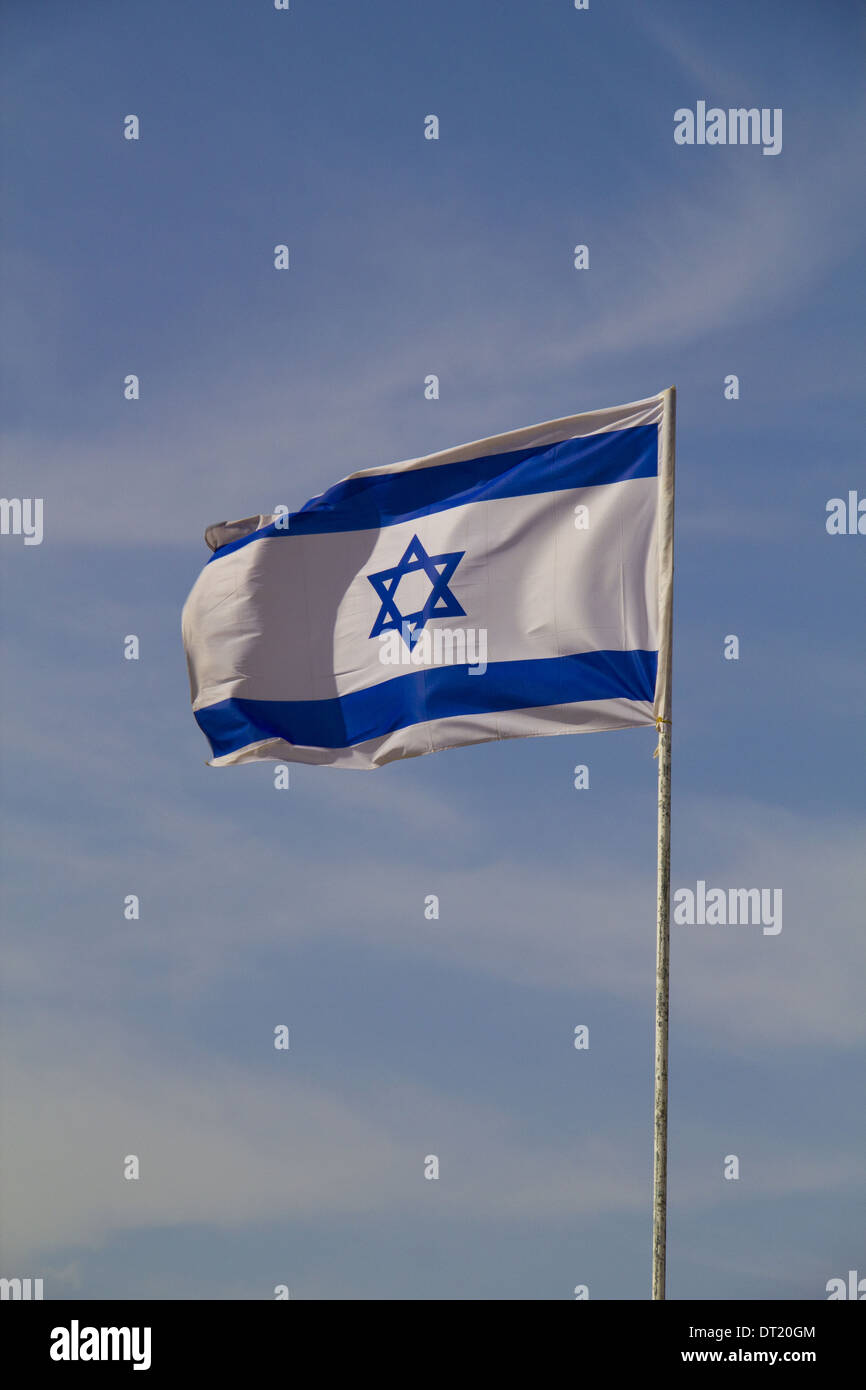 The blue and white national flag of Israel blowing in the wind Stock ...
