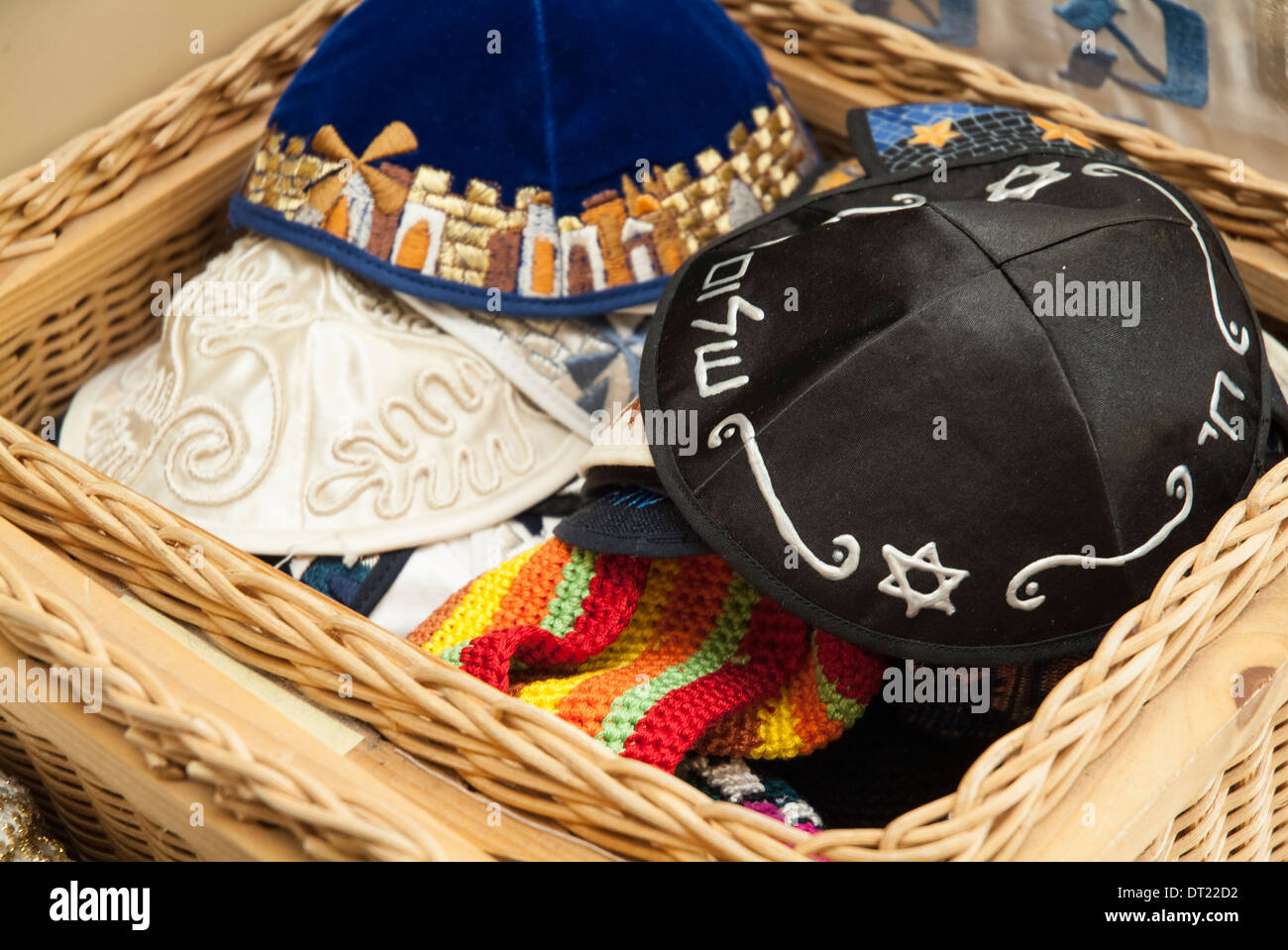A display basket filled with prayer caps, scullcaps, kipot, yarmuke, in a Jewish gift shop