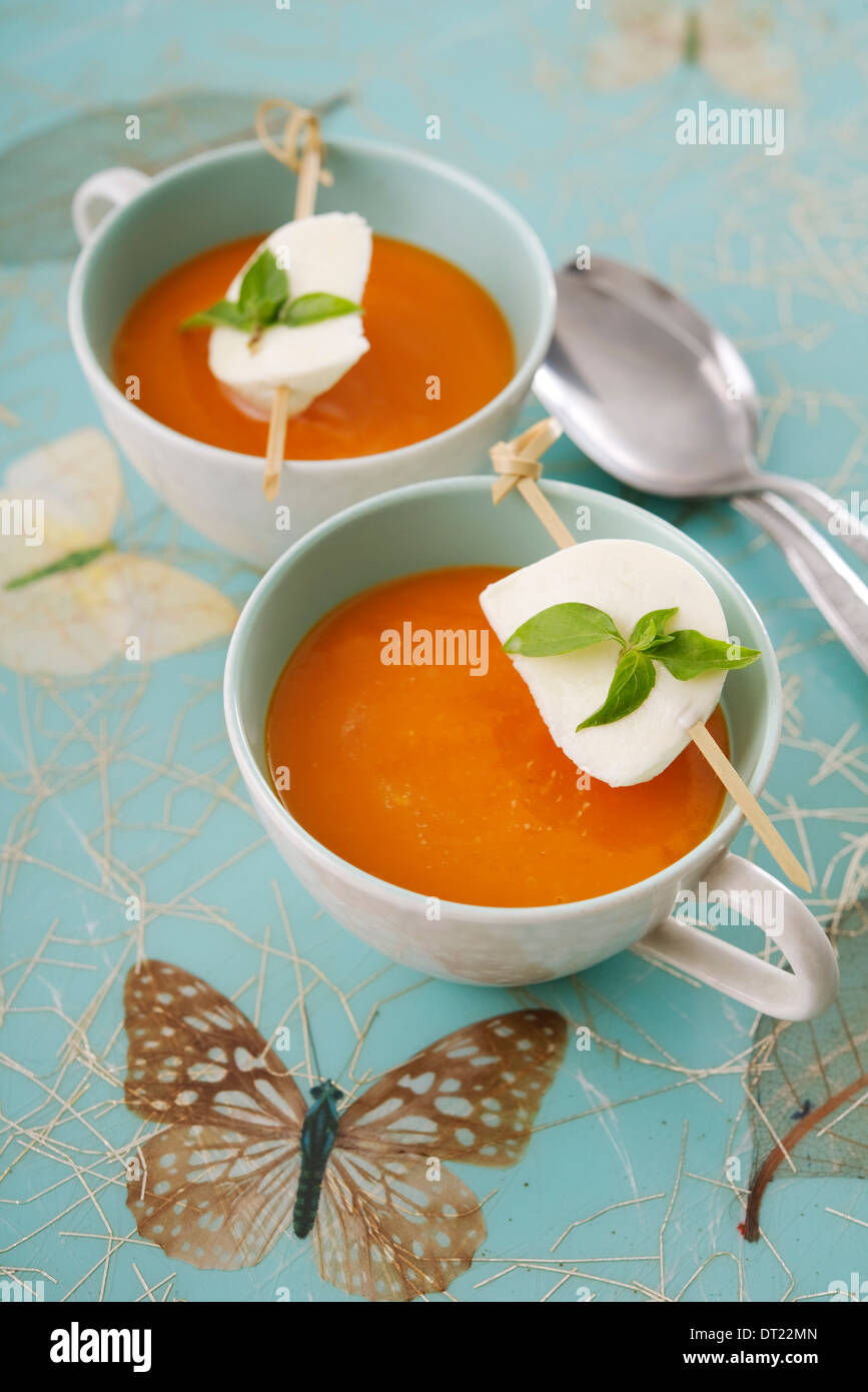 Tomato soup and mozzarella Stock Photo Alamy
