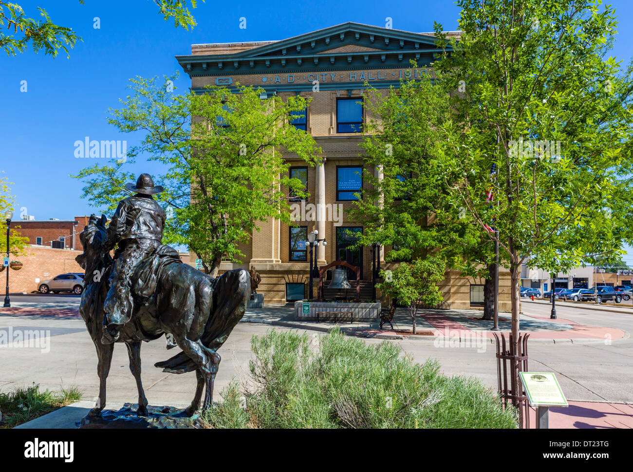 Cowboy statue in front of City Hall in historic downtown Sheridan ...