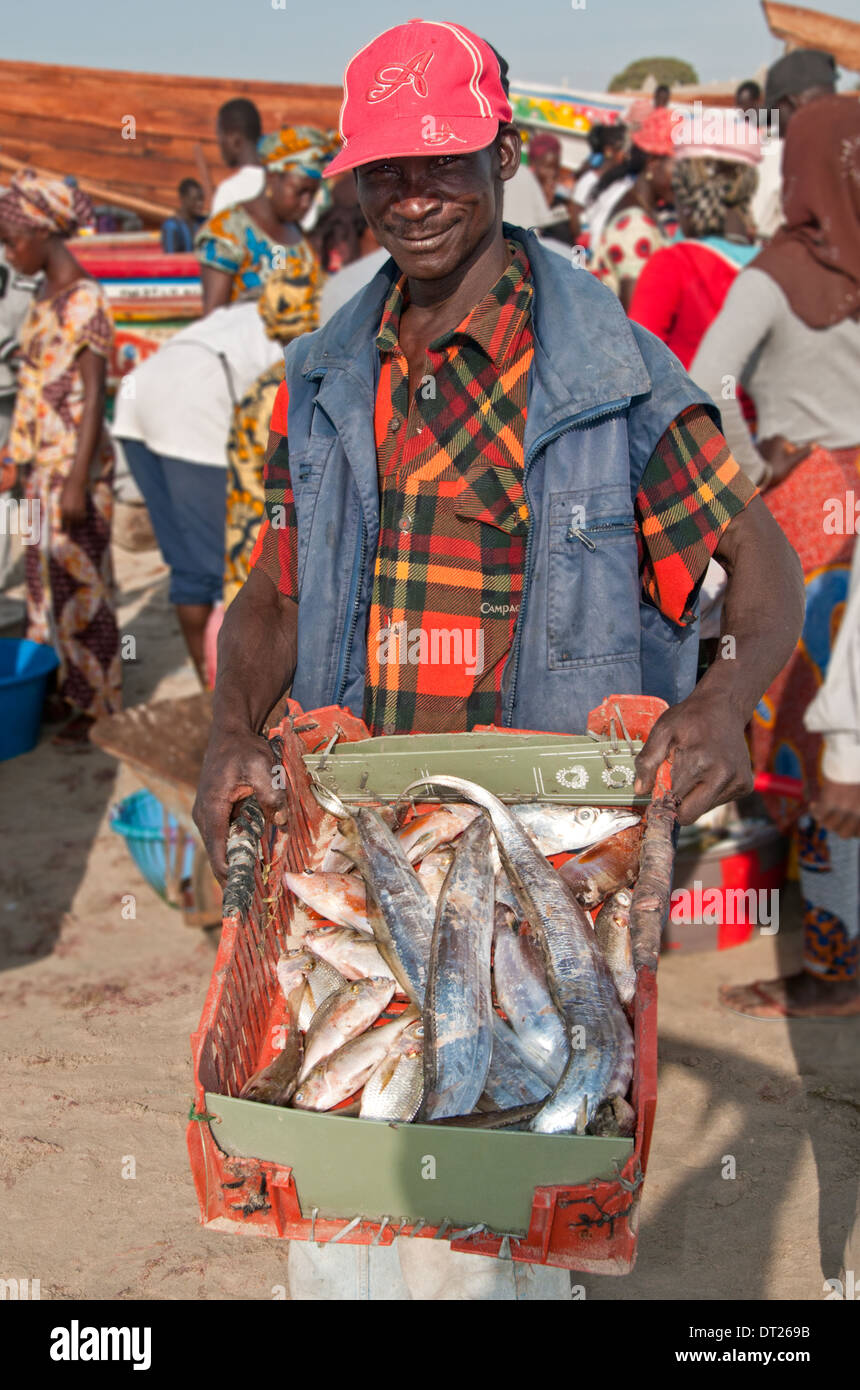 Local Fisherman Displaying his Catch, Tanji Fishing Village, The Gambia, West Africa Stock Photo