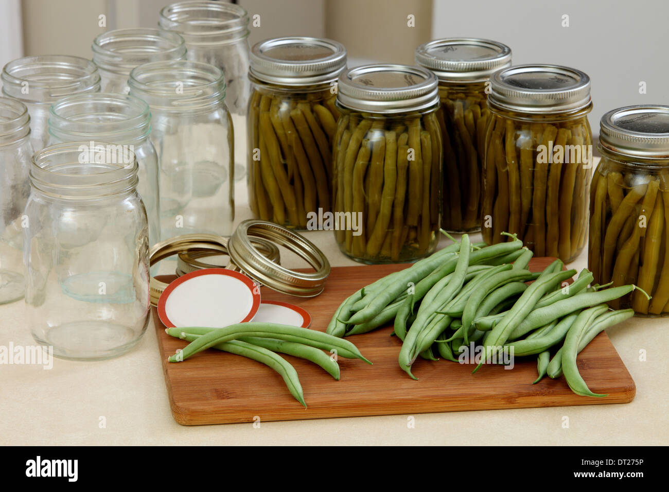 A pressure canner and bottles for preserving beans Stock Photo Alamy
