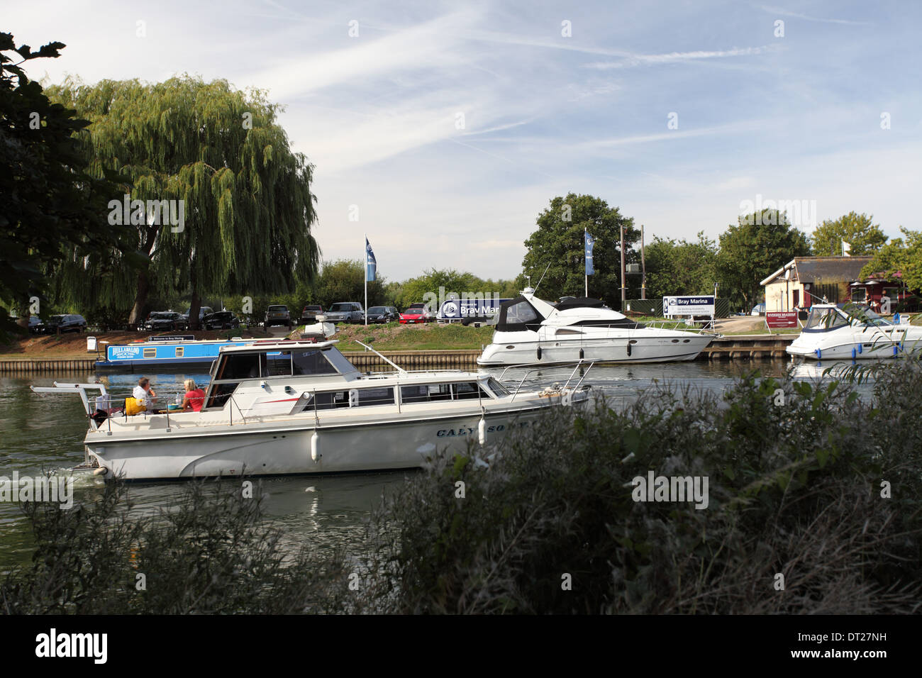 Motorised pleasure boat cruising on he river Thames, Bray Marina, Berkshire Stock Photo