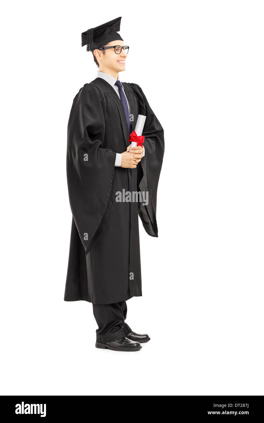 Full length portrait of a young male graduate student holding a diploma ...