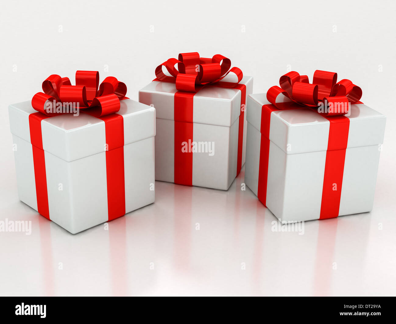 white gift boxes with red ribbon on a white background Stock Photo Alamy