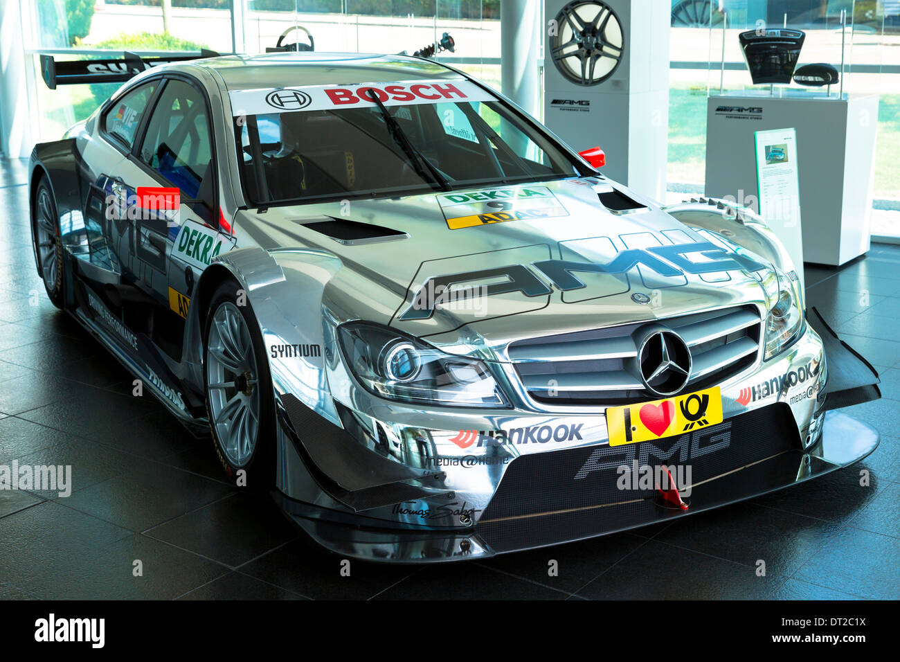 DTM Mercedes-AMG C-Coupe 2013 race car on display in showroom at engine factory in Affalterbach, Germany Stock Photo