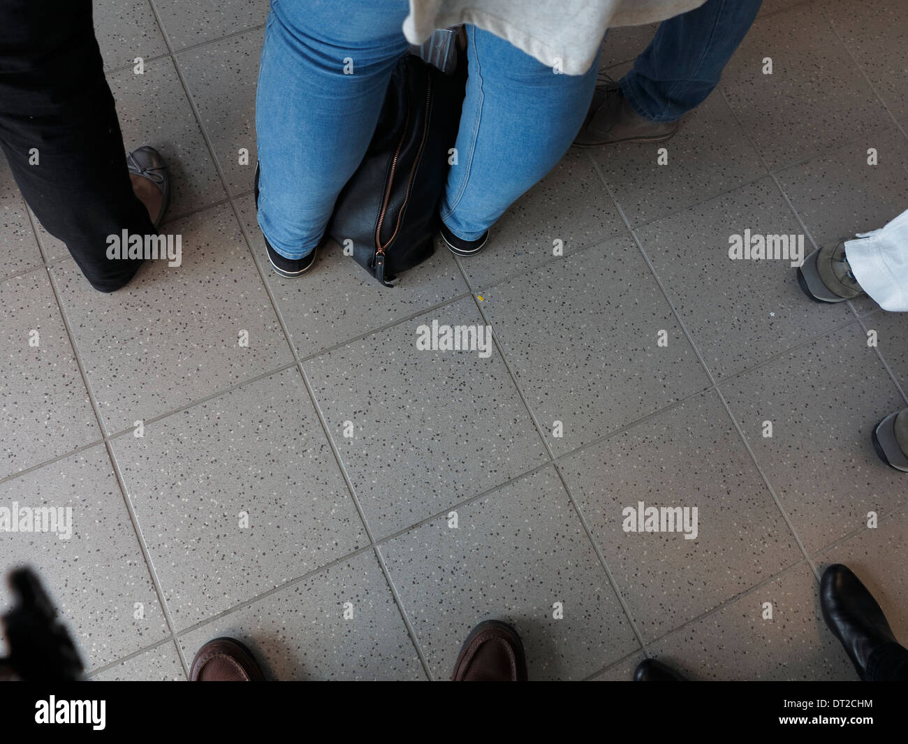Please Wait In Line waiting in line at an airport Stock Photo - Alamy