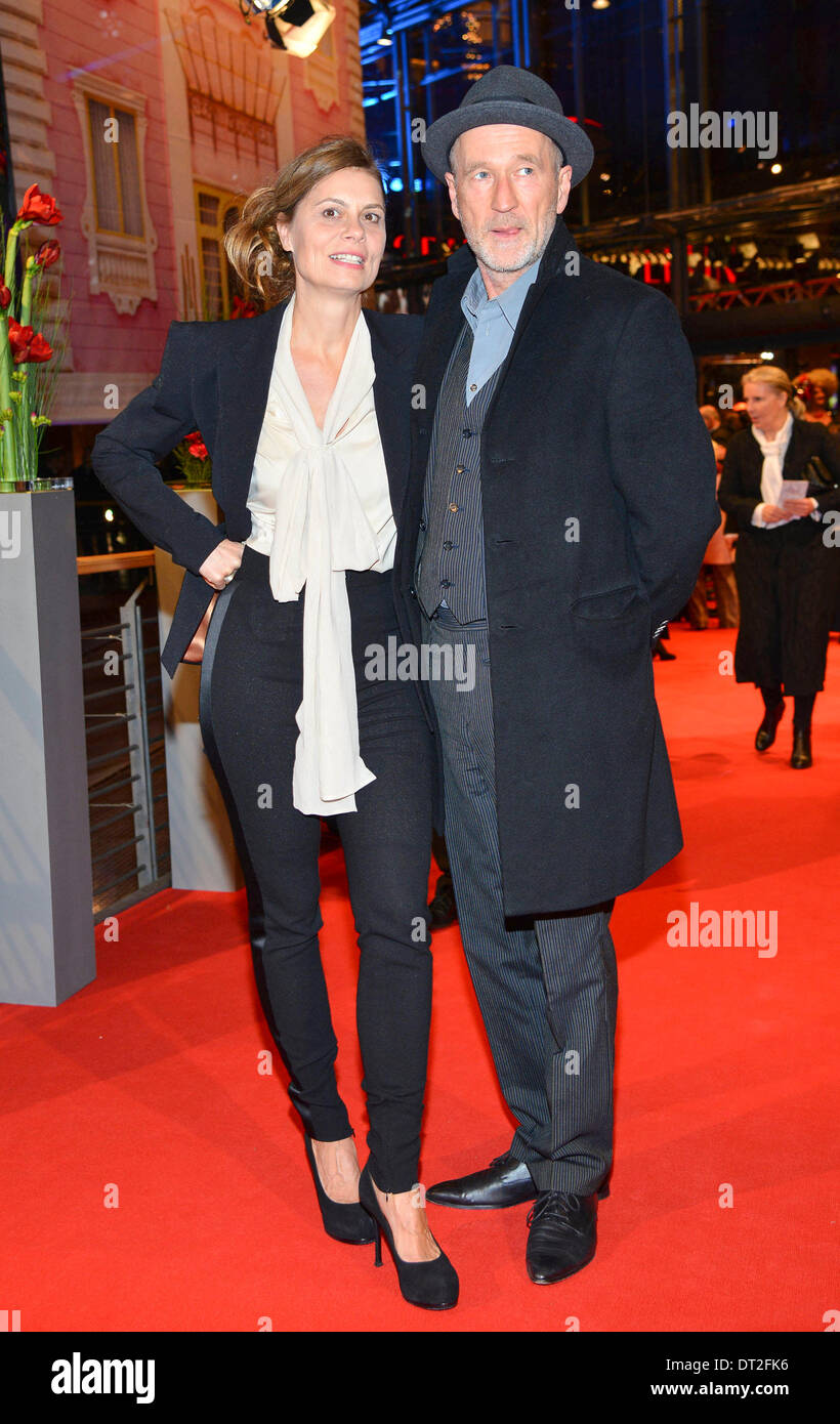Actor Peter Lohmeyer and wife Sarah Wiener arrives at the premiere of The Grand Budapest Hotel during the 64th annual Berlin International Film Festival aka Berlinale at Berlinalepalast in Berlin, Germany, on 06 February 2014 Stock Photo