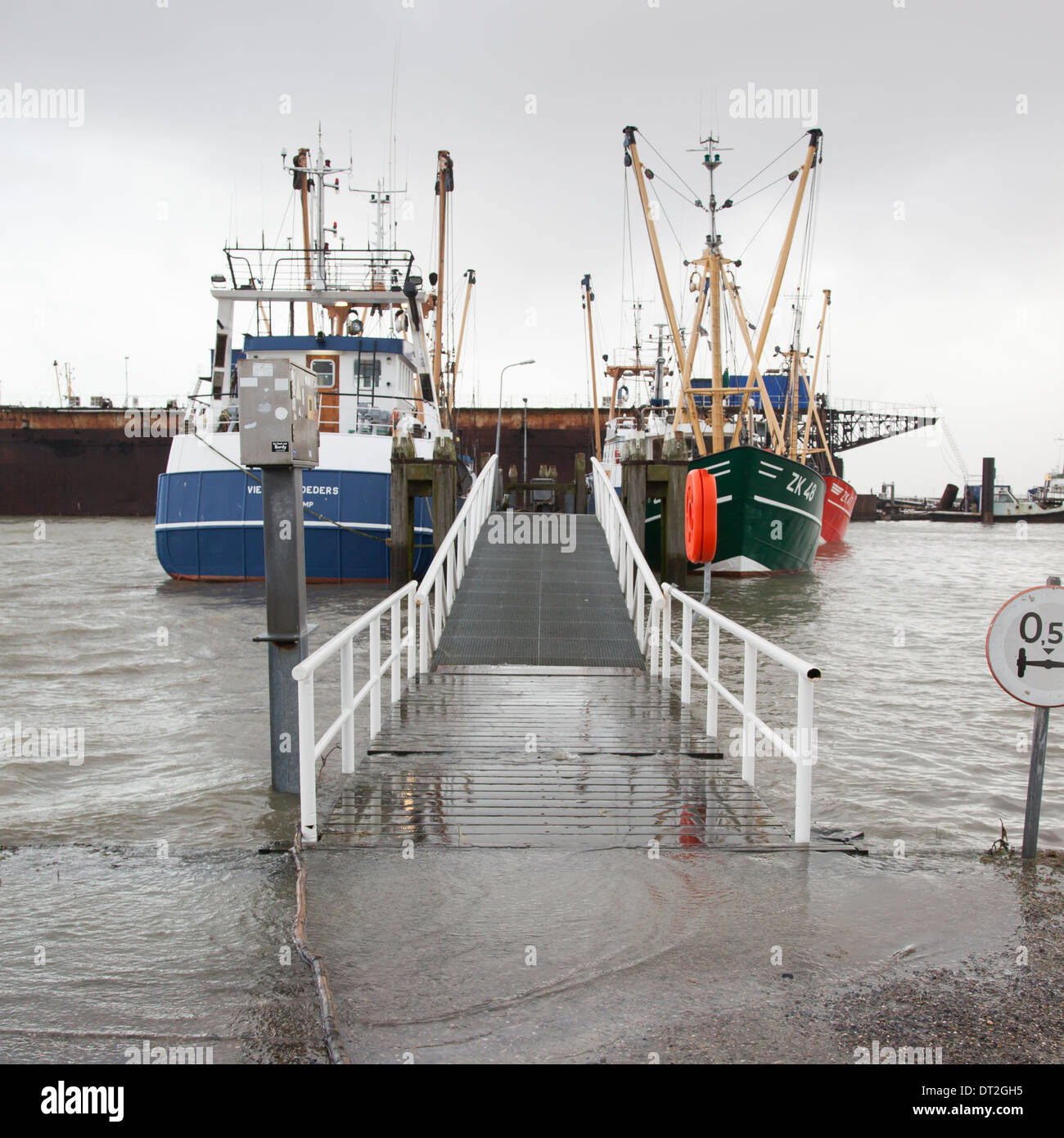 Extreme high tide at the dikes of the dutch coastal works Stock Photo