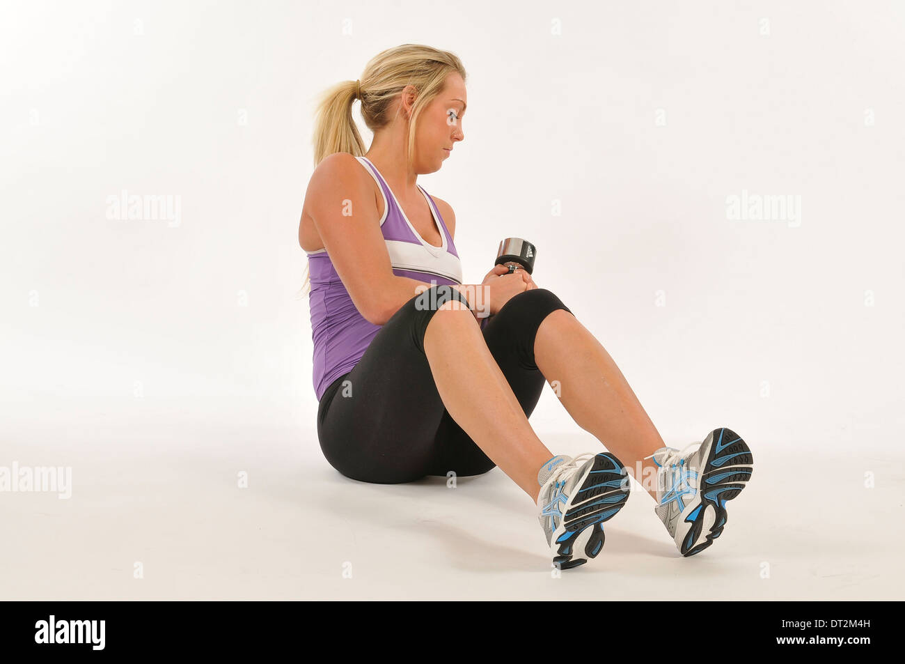 Exercise on fit ball to increase strength and core stability Stock