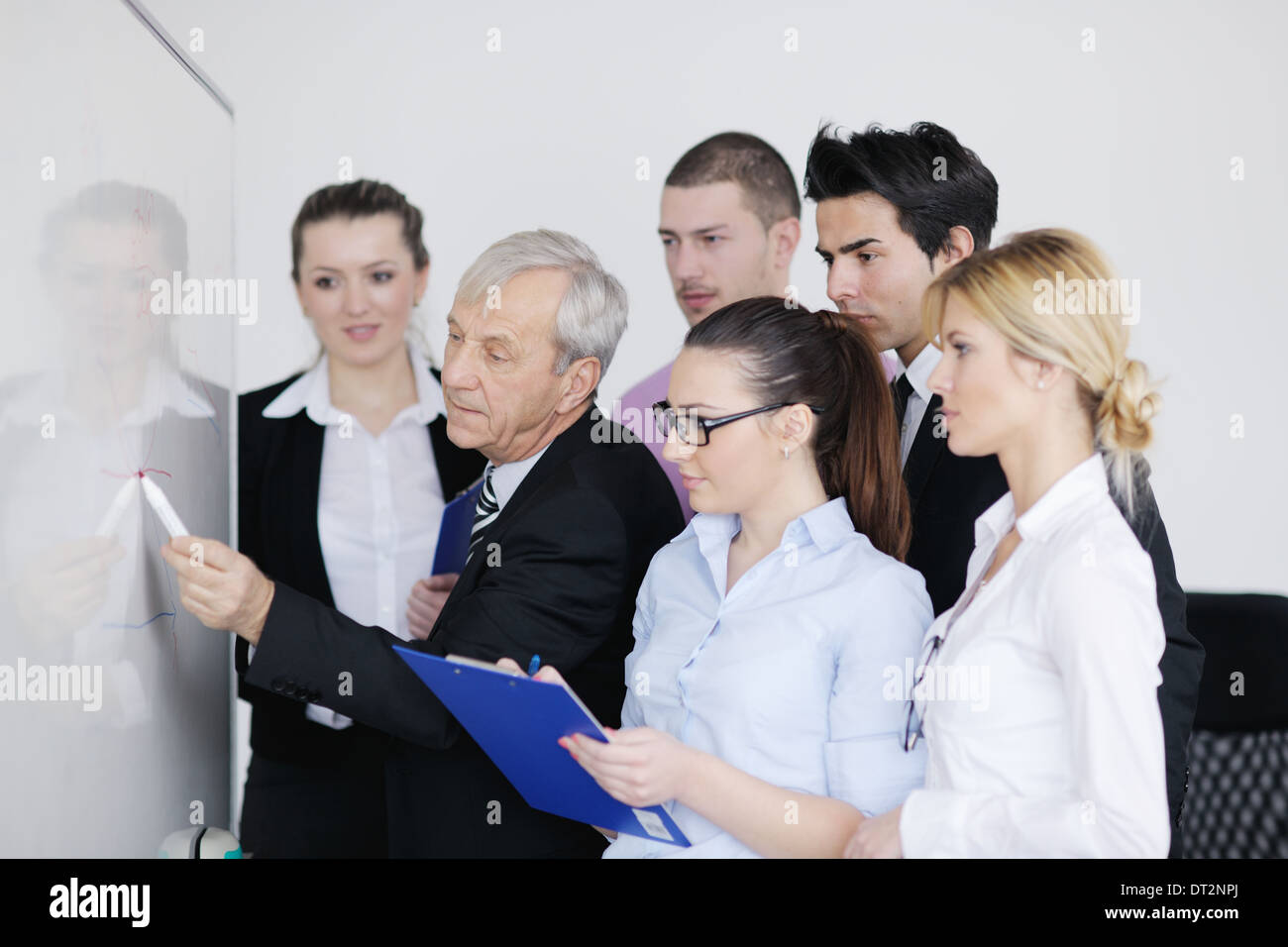 Senior business man giving a presentation Stock Photo - Alamy