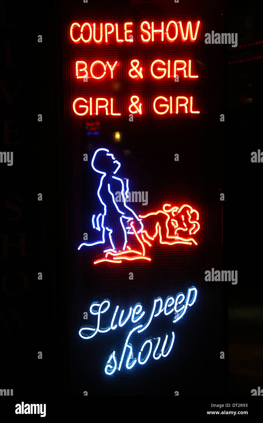 Neon lights of the Sex Palace porn shop and sex show theatre in the Red Light District famous for prostitutes and prostitution i Stock Photo picture
