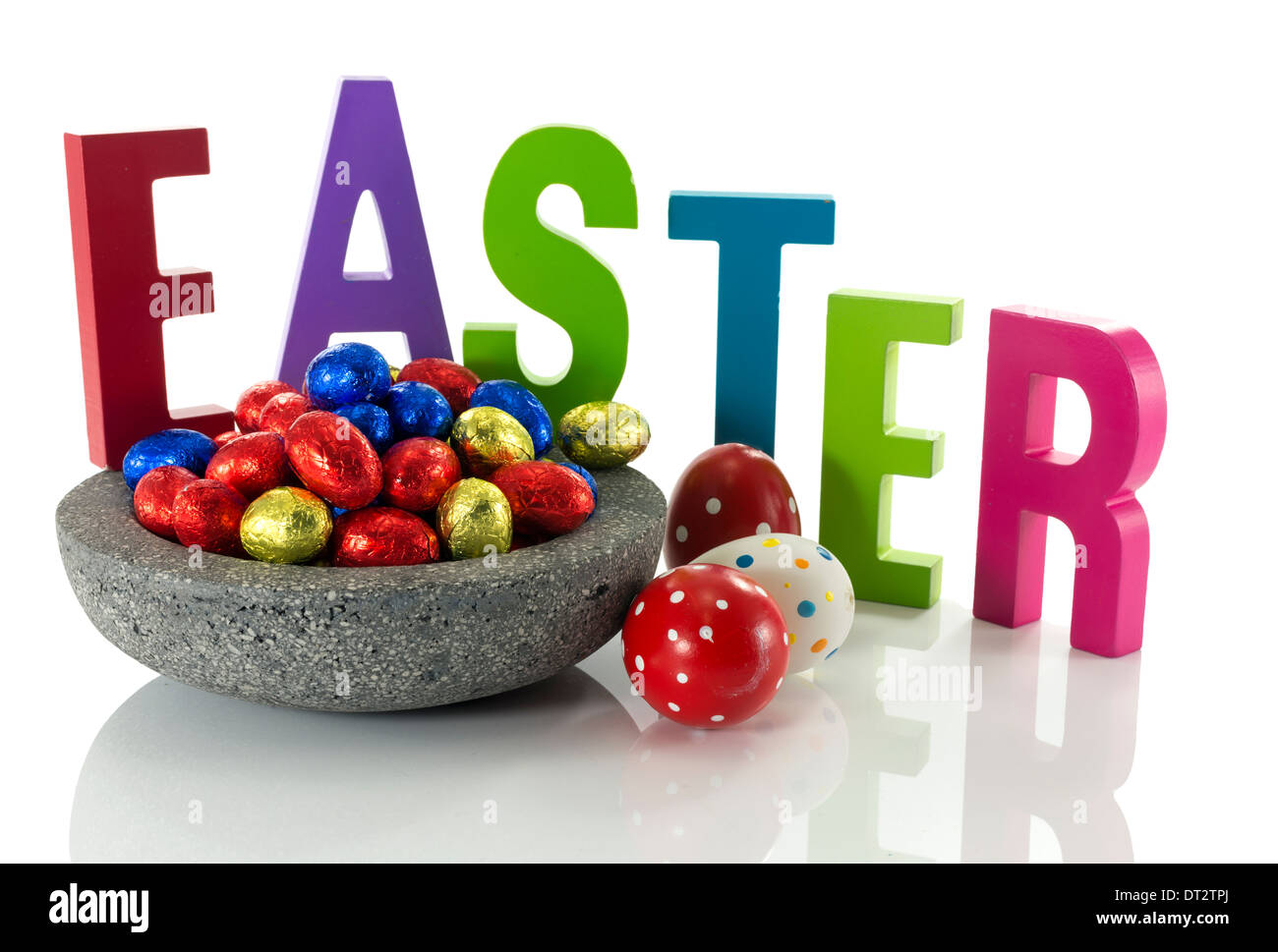 concrete dish with easter eggs isolate on white Stock Photo