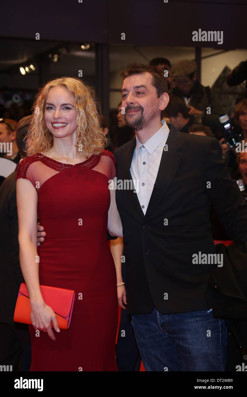 German actress Nina Hoss (l) and partner, British music producer Alex Silva attend the world premiere of 'The Grand Budapest Hotel' during the 64th International Berlin Film Festival aka Berlinale at Berlinale Palast in Berlin, Germany, on 06 February 2014. Photo: Hubert Boesl Stock Photo