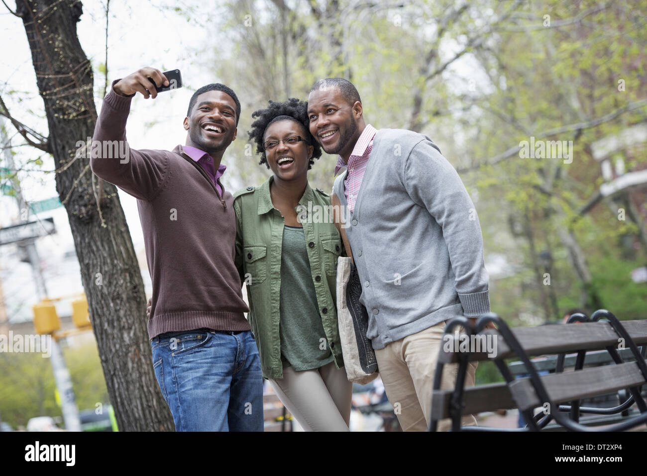 Outdoors In The City An Urban Lifestyle Three People Posing Together outdoors-in-the-city-an-urban-lifestyle-three-people-posing-together