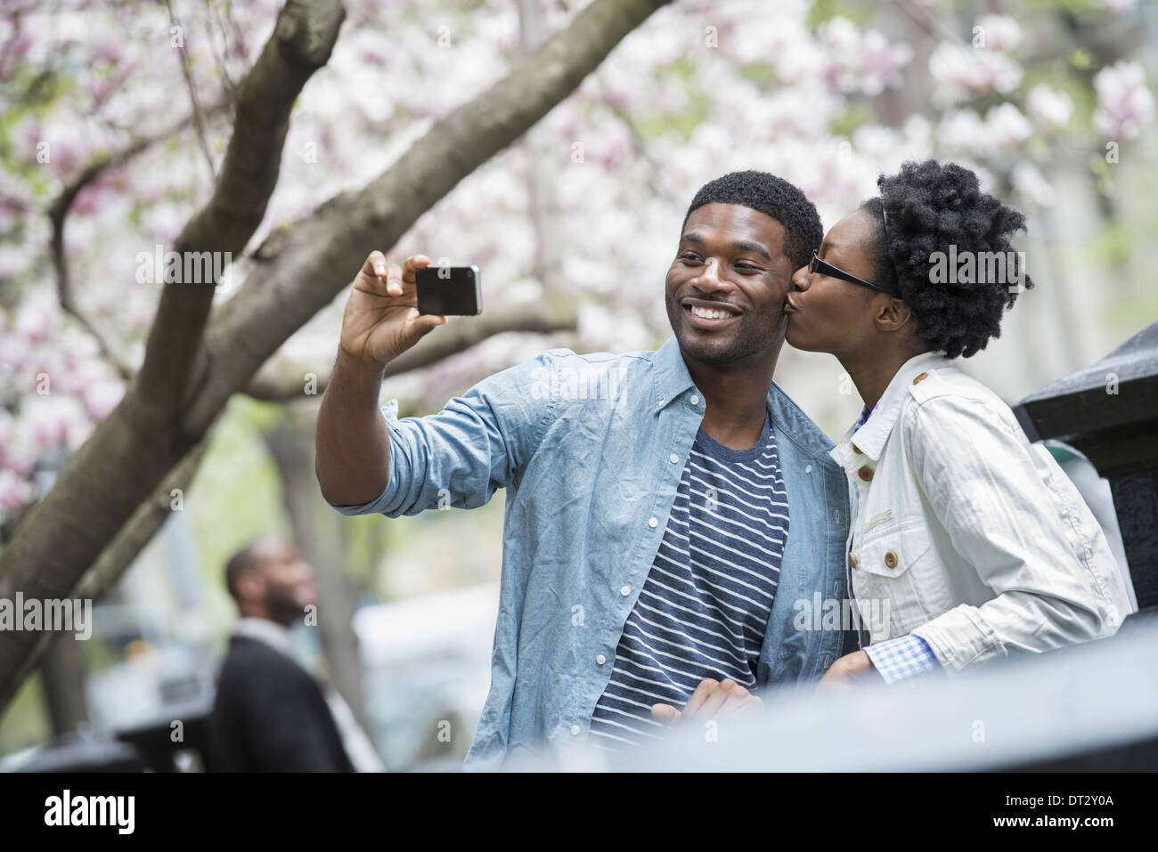 Beautiful woman kissing man hi-res stock photography and images - Alamy